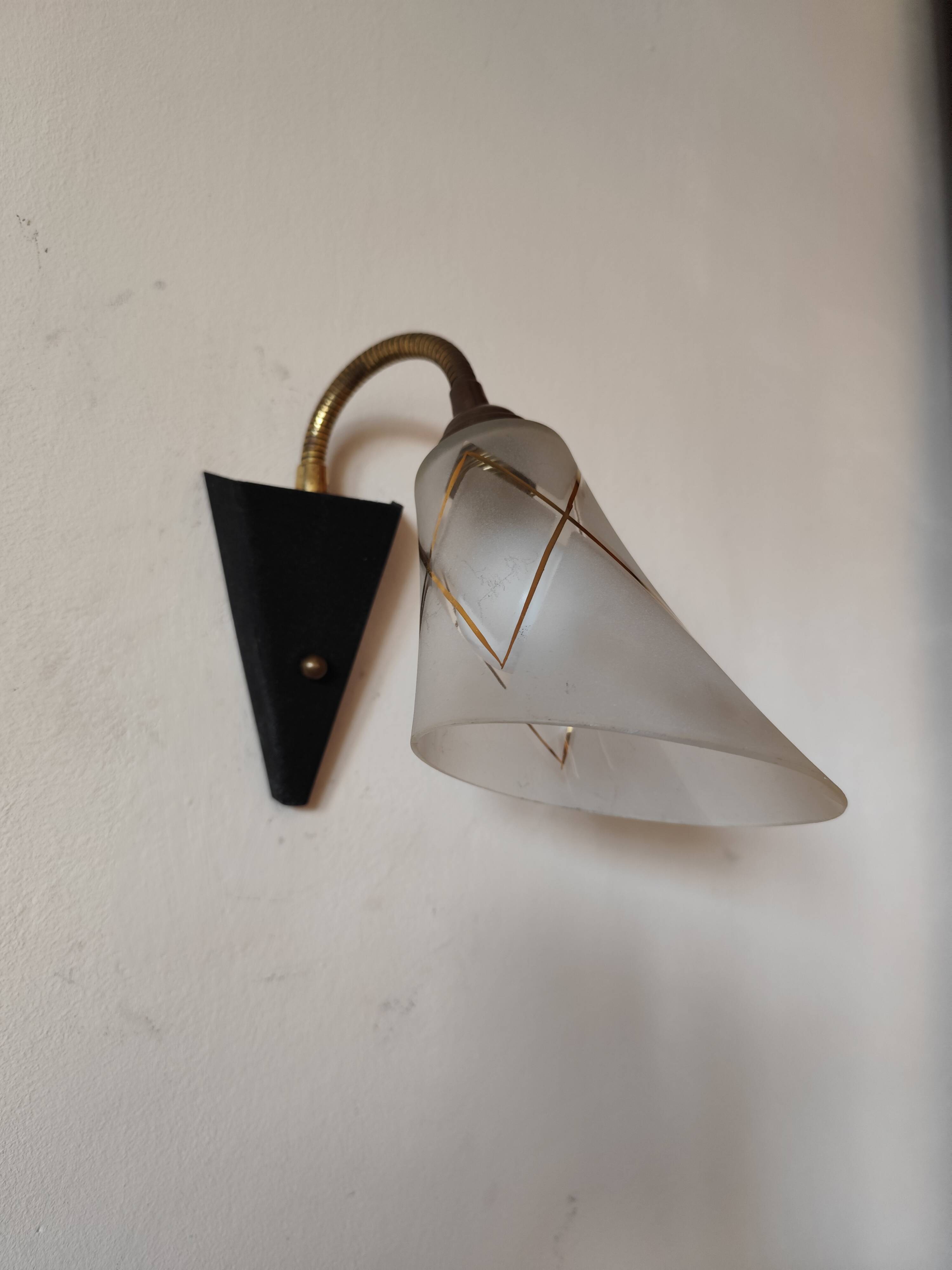 1950s wall lamp, metal, flexible brass stem and opaque shade.