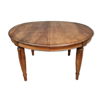 Art Deco period elongation table in solid walnut with blonde patina