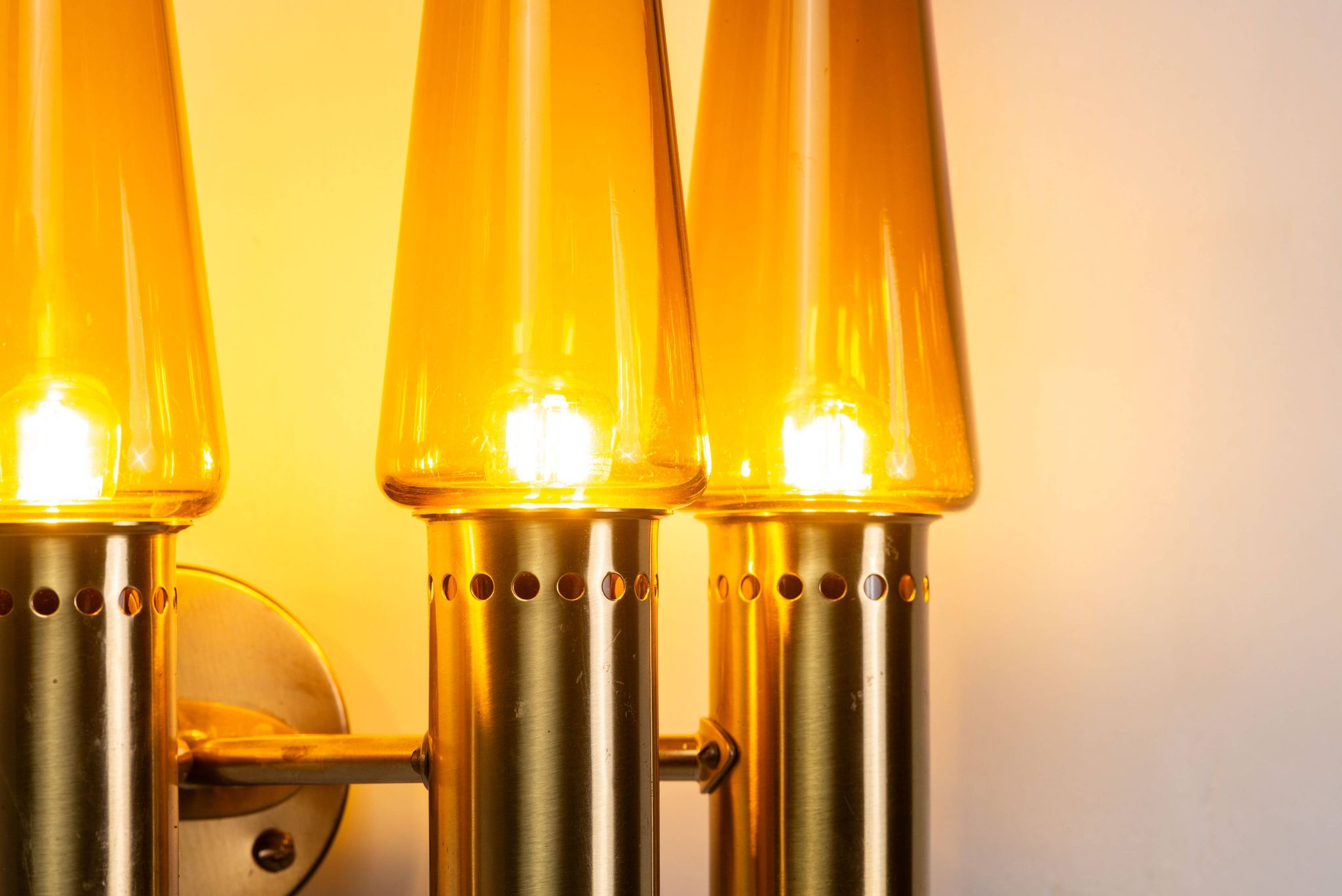 Hans Agne Jakobsson wall lamp made from brass with orange shades