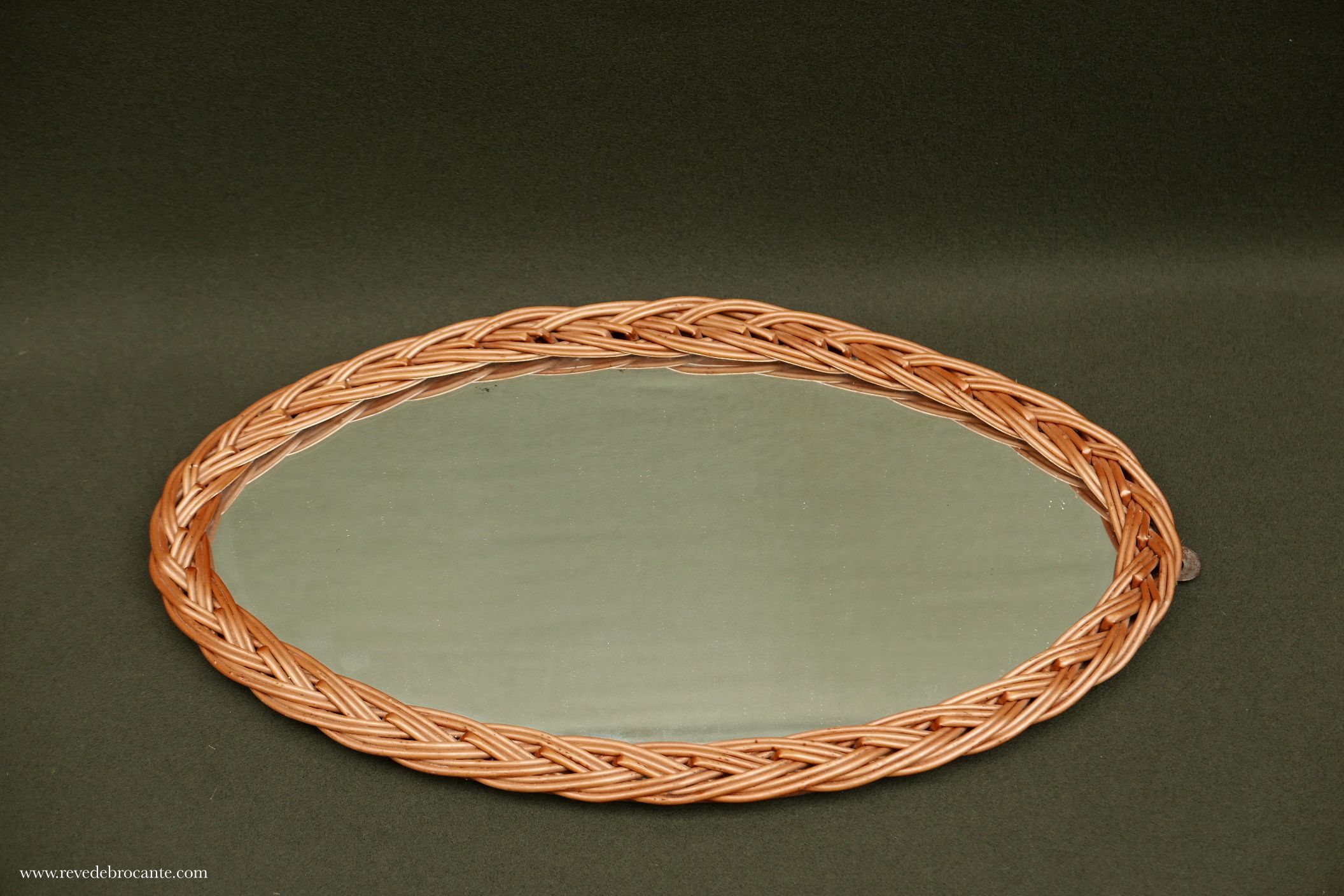 Vintage rattan oval mirror