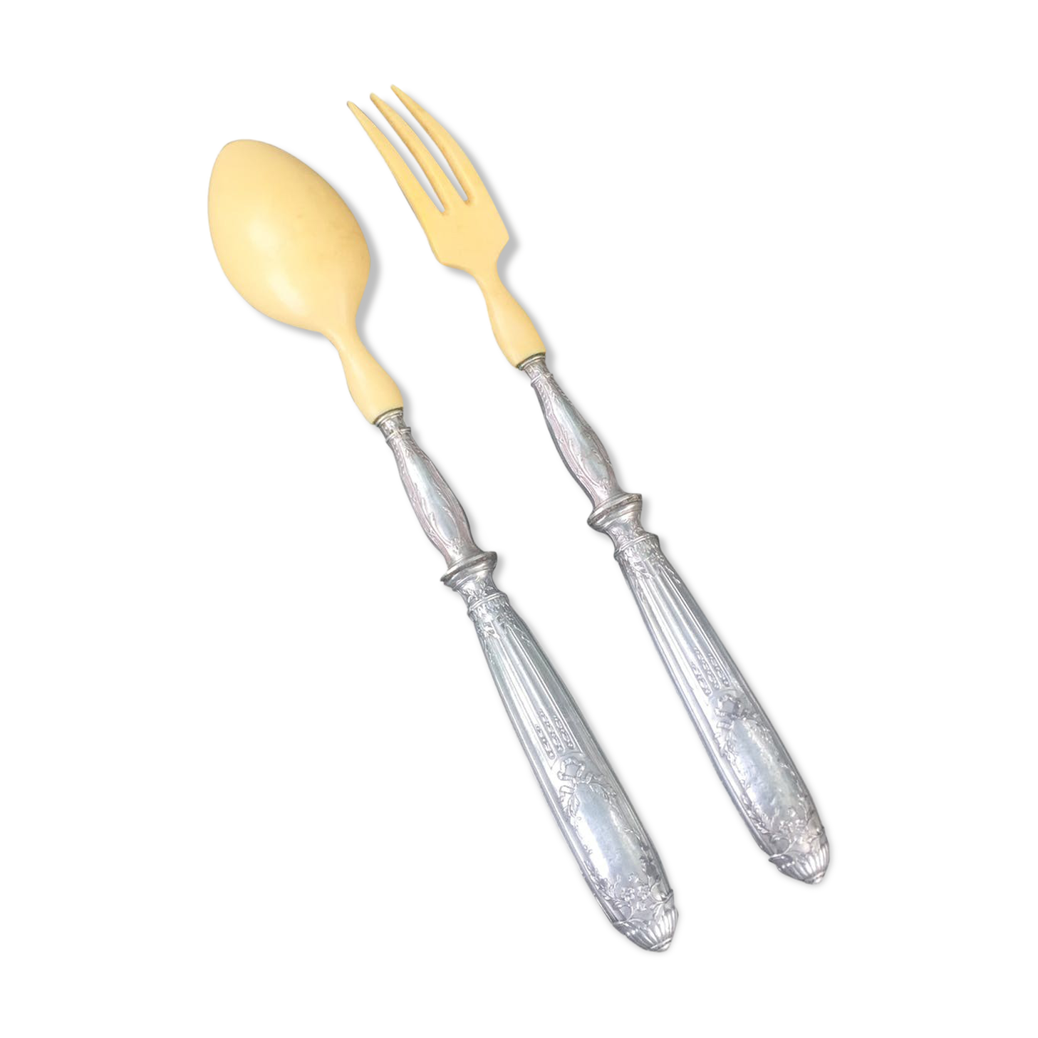 Silver and ivory salad cutlery in early 20th century