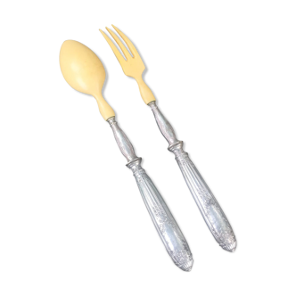 Silver and ivory salad cutlery in early 20th century