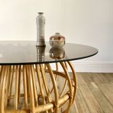 Designer round coffee table in rattan and smoked glass 1970