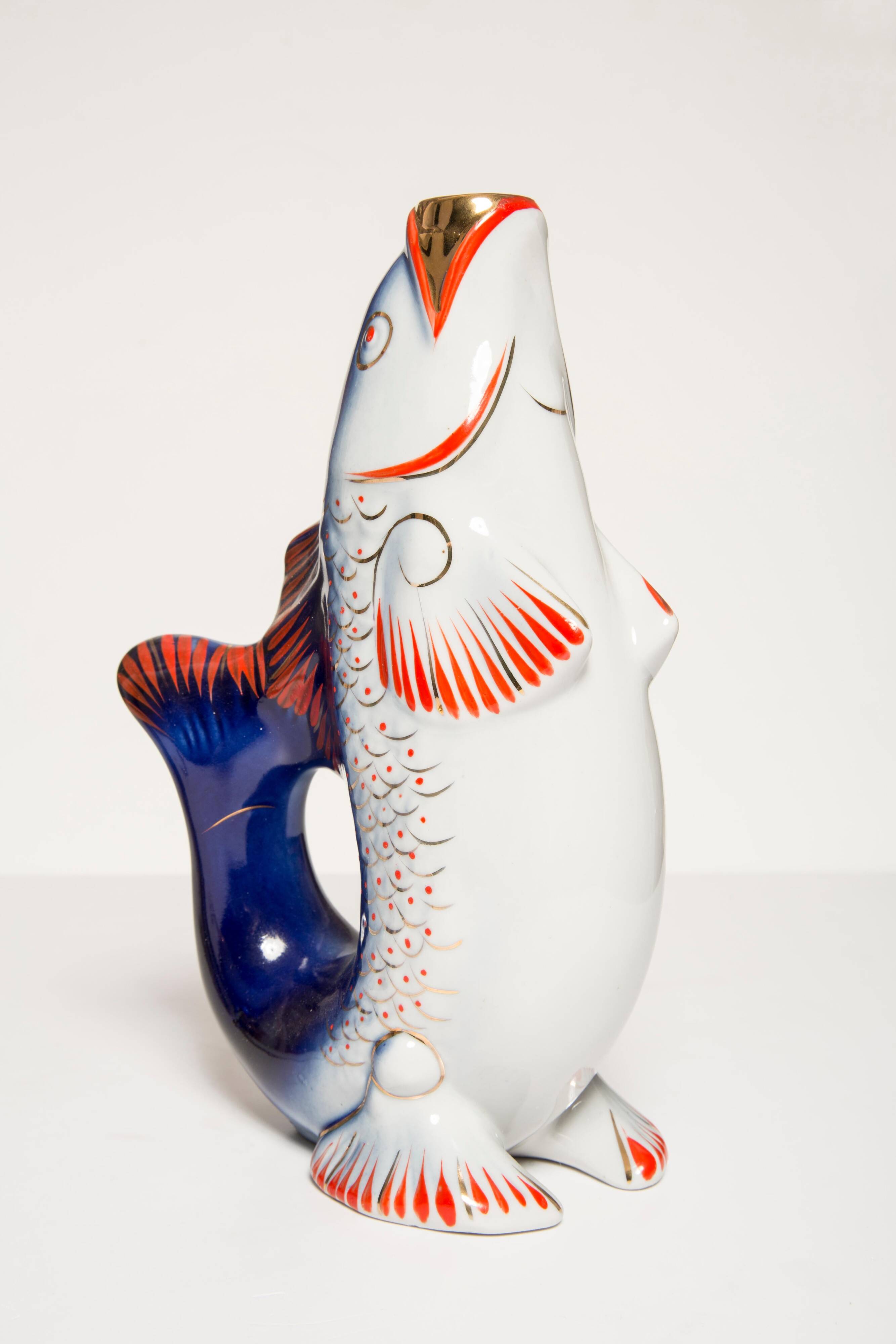 Set of 7 glasses and a glass carafe decorated with blue fish, Mid-Century Modern style, Europe, 1960s.