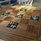Round dining table Audoux Minet with 4 chairs and 2 armchairs.