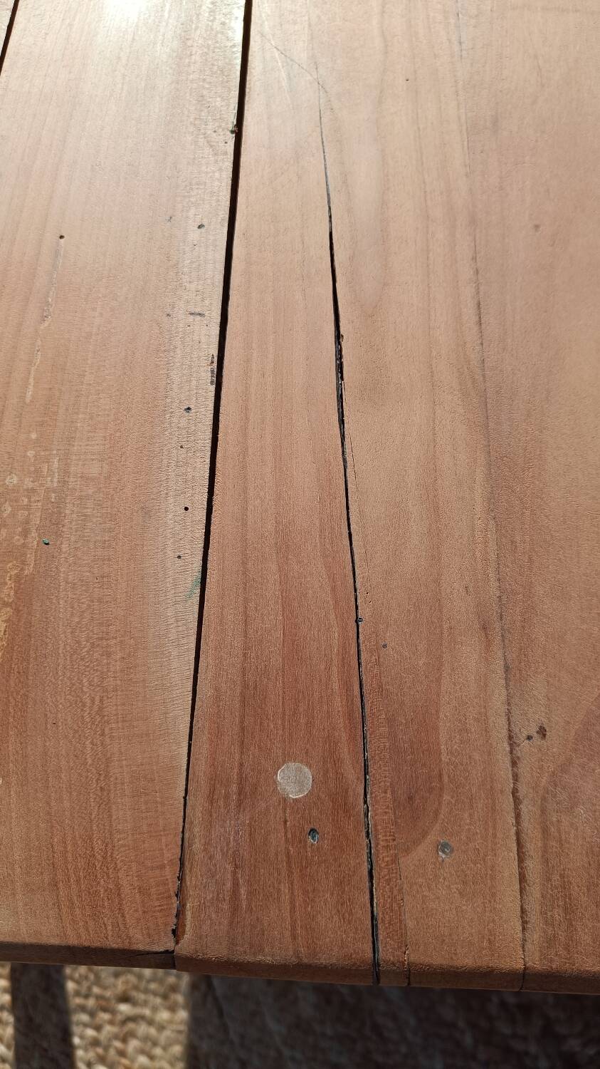 Low farmhouse table in raw wood