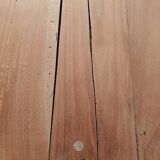Low farmhouse table in raw wood