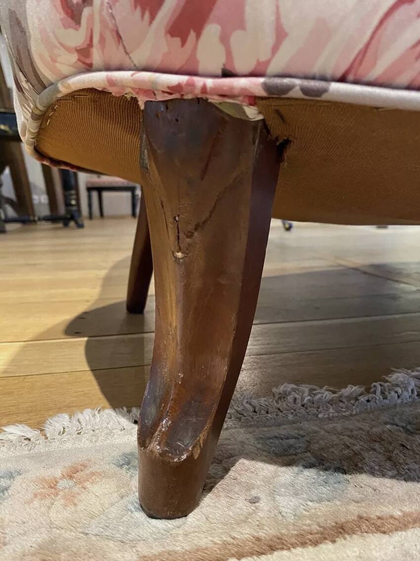 Napoleon III sofa upholstered in a floral patterned fabric