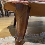 Napoleon III sofa upholstered in a floral patterned fabric