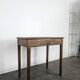 Small oak side table with one drawer, 19th-century tapered legs.