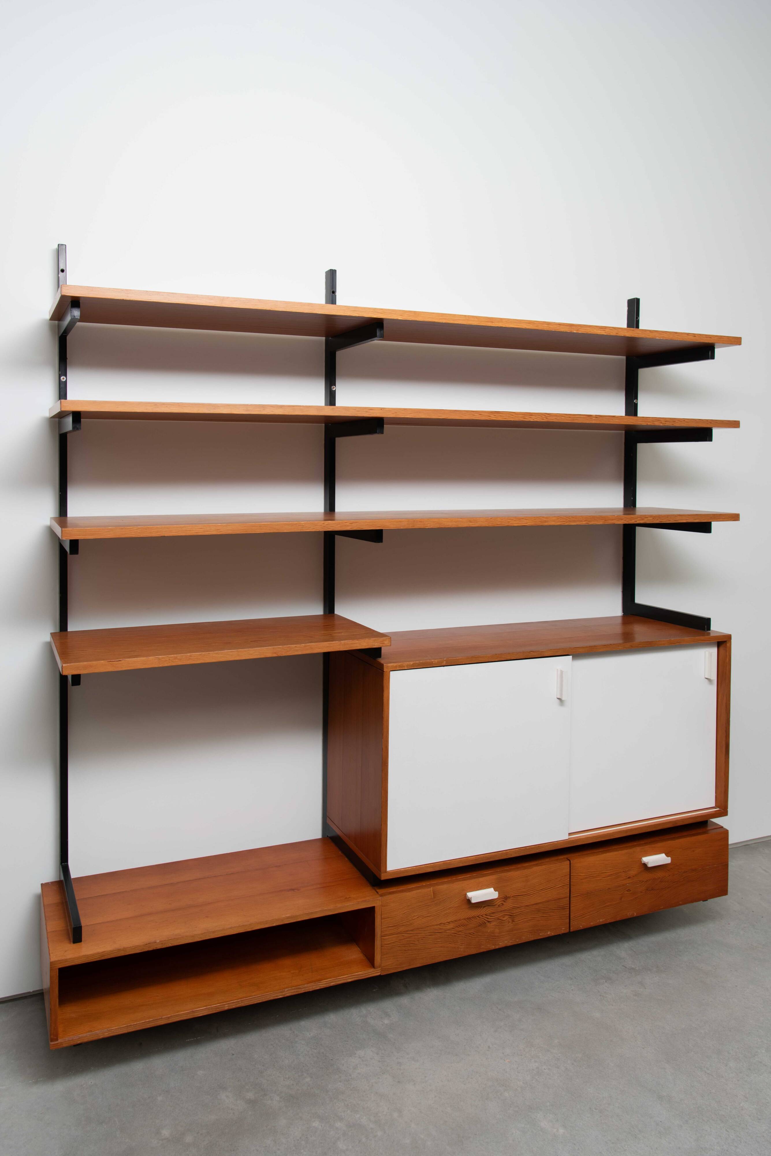 Teak wall shelf designed by Jul de Roover