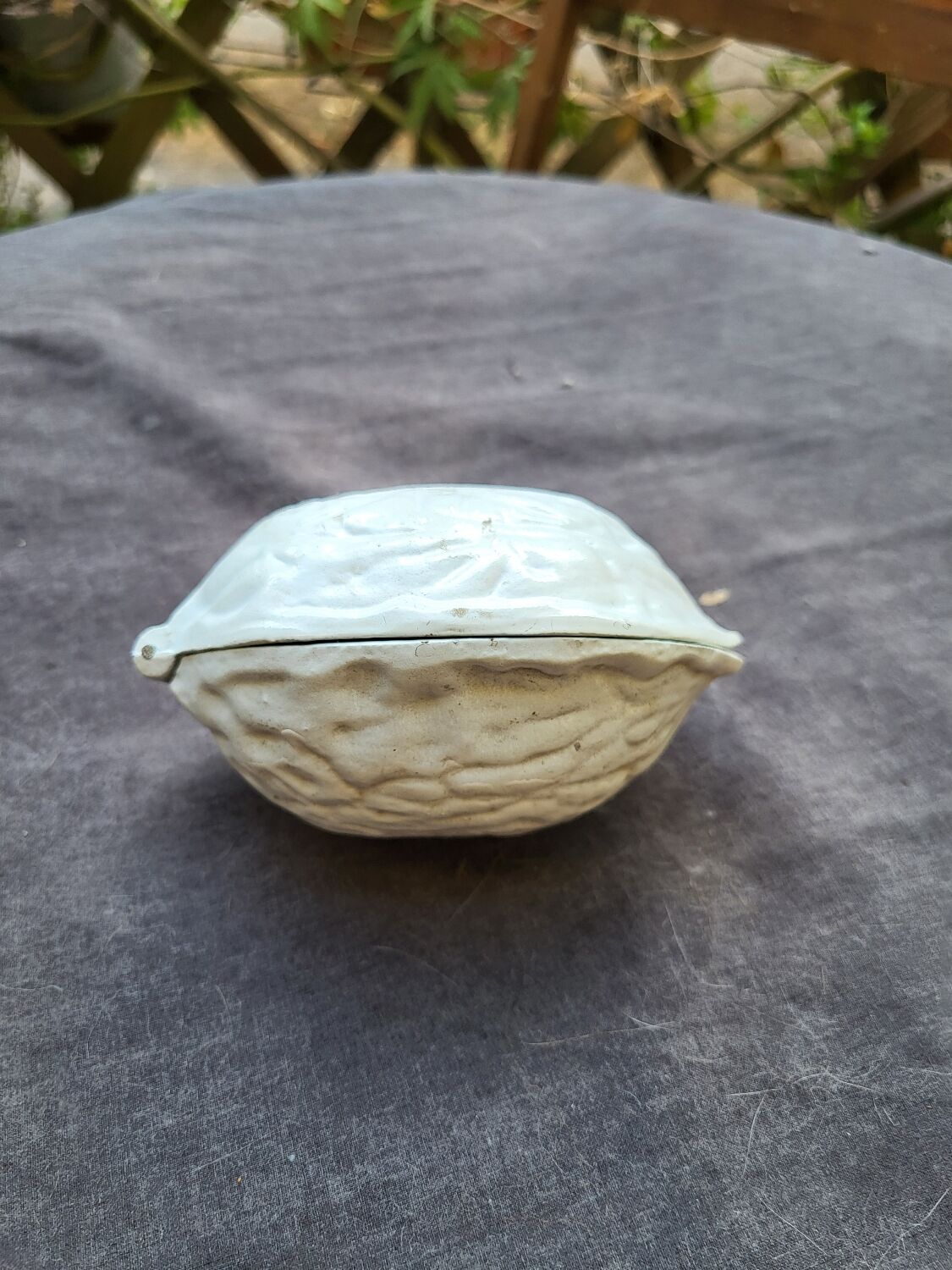 Vintage cast iron nut crate