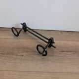 Wrought iron wall coat rack