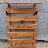 Wall-mounted coat rack in iron and wooden slats