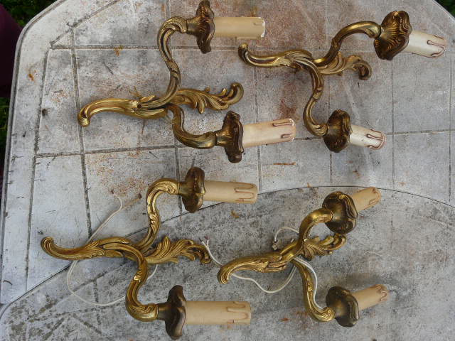 Two pairs of bronze wall lamps