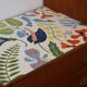 Console, freestanding or wall-mounted Scandinavian shelf in teak and paper with Josef Frank pattern.