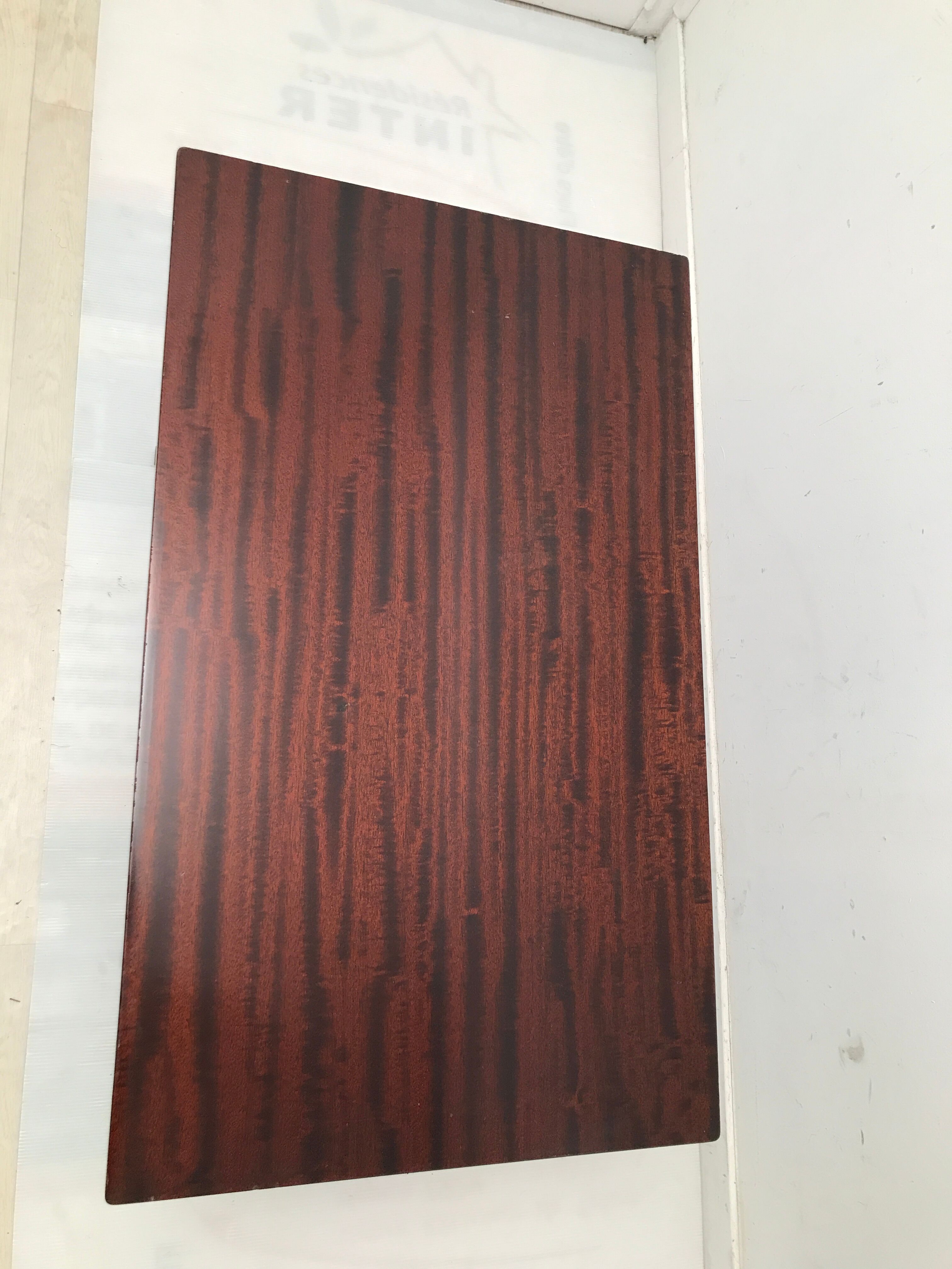 Empire style coffee table in wood veneer and brass