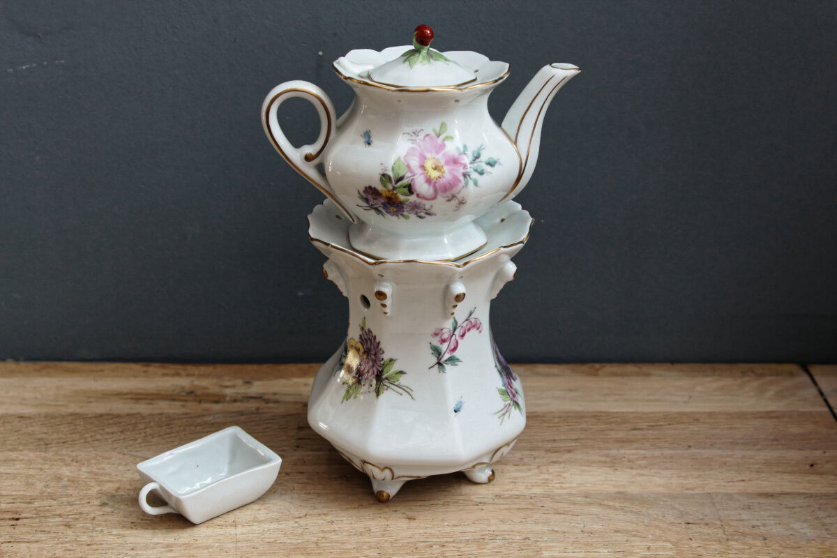 Old earthenware herbal tea maker