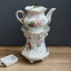 Old earthenware herbal tea maker