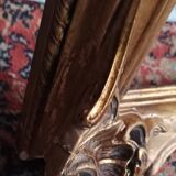 Old frame in wood and gilded stucco