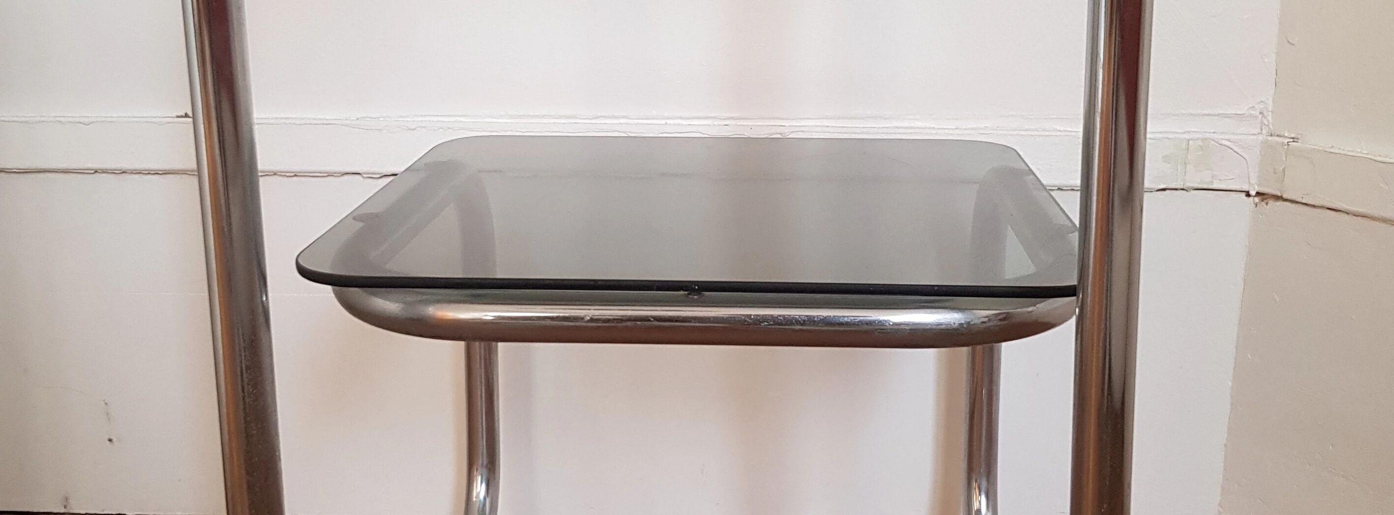 Metal console and smoked glass