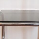 Metal console and smoked glass