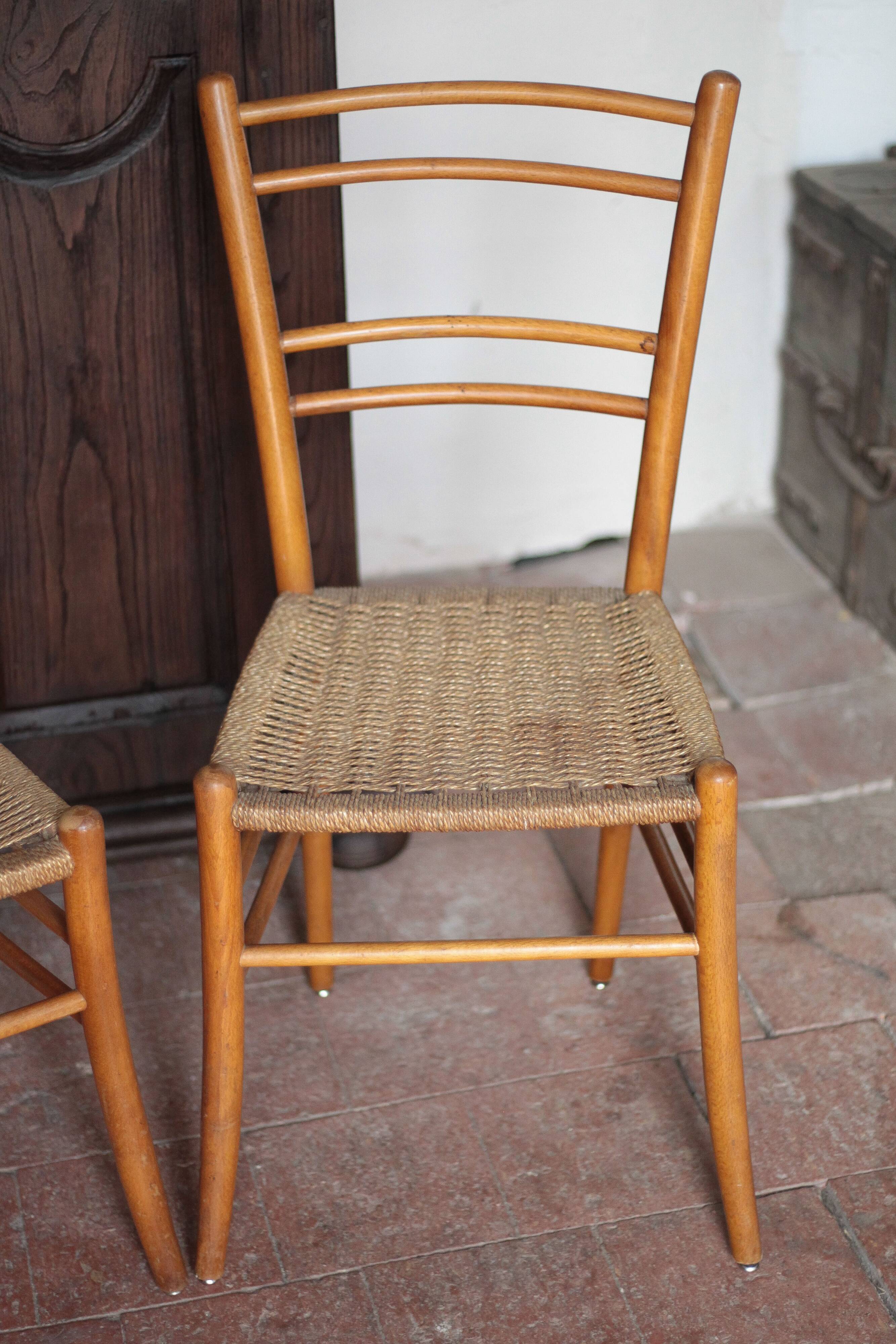 Pair of wooden chairs with vintage rope seats, vintage rope chairs
