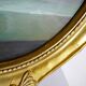 Large oil on canvas bouquet medallion wooden frame gilded stucco vintage