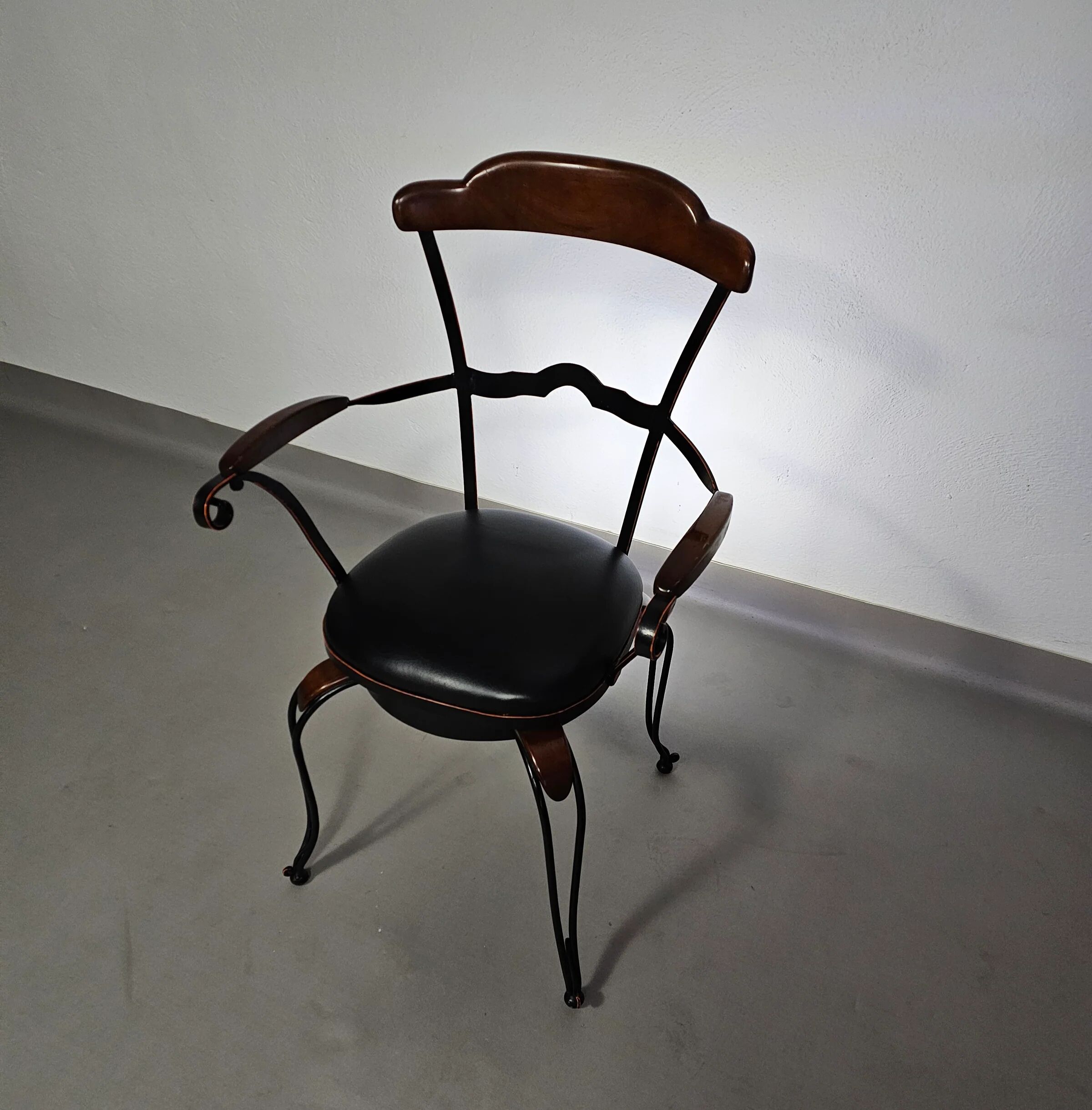 Italian postmodern turnable wrought iron dining chairs with leather seats