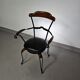 Italian postmodern turnable wrought iron dining chairs with leather seats