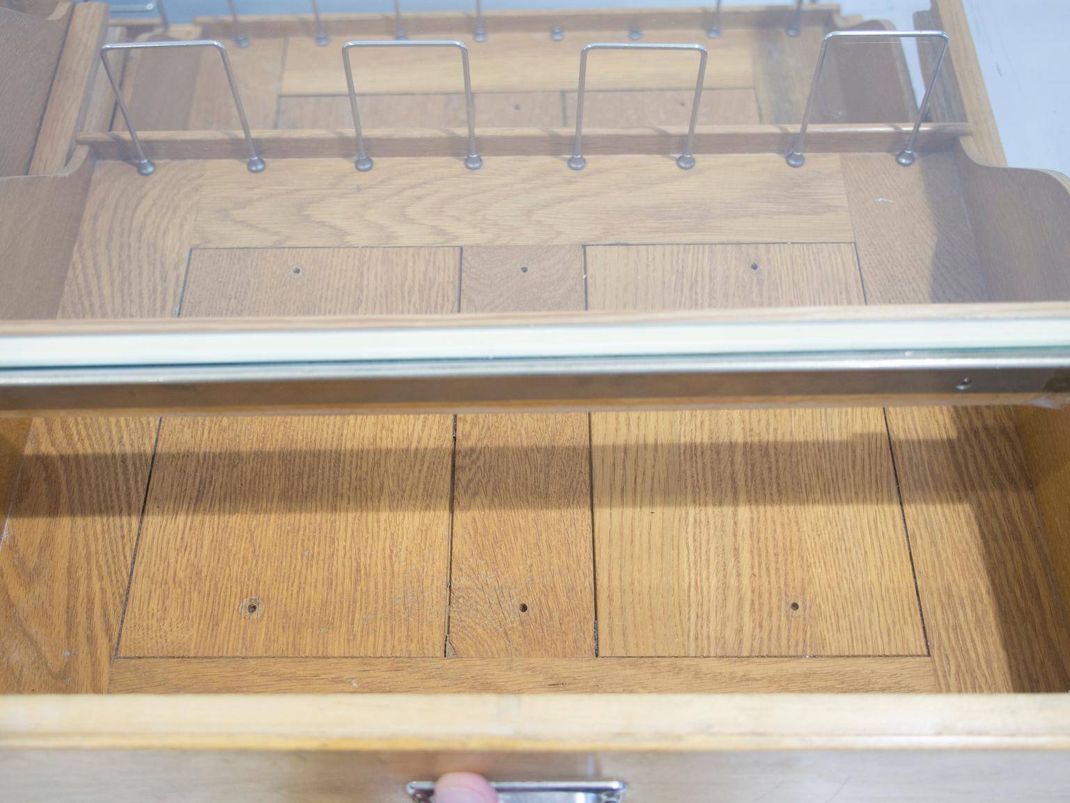 Shop counter made of birch and oak with twenty drawers, 1940s.