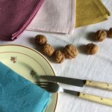 Set of four old damask towels tinted in multiple colors