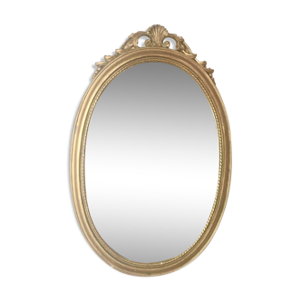 Miroir ovale en stuc et bois doré XIXème 38x59cm