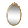 Miroir ovale en stuc et bois doré XIXème 38x59cm