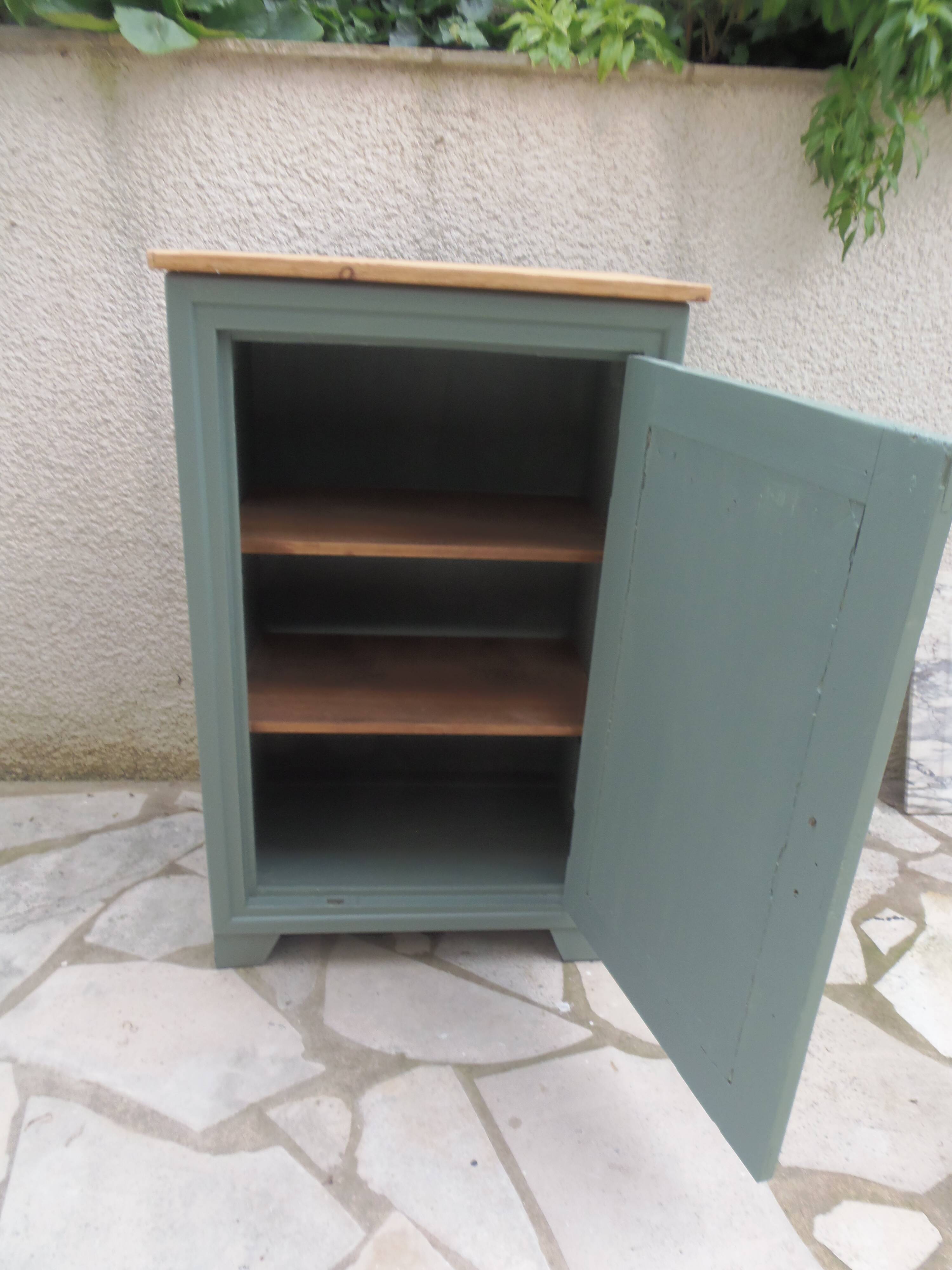 Vintage jam jar enhanced in smoky green, wooden tray.