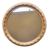 Large round mirror in Spanish gilded carved wood