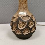 Small beautiful ceramic table lamp in earth colors.