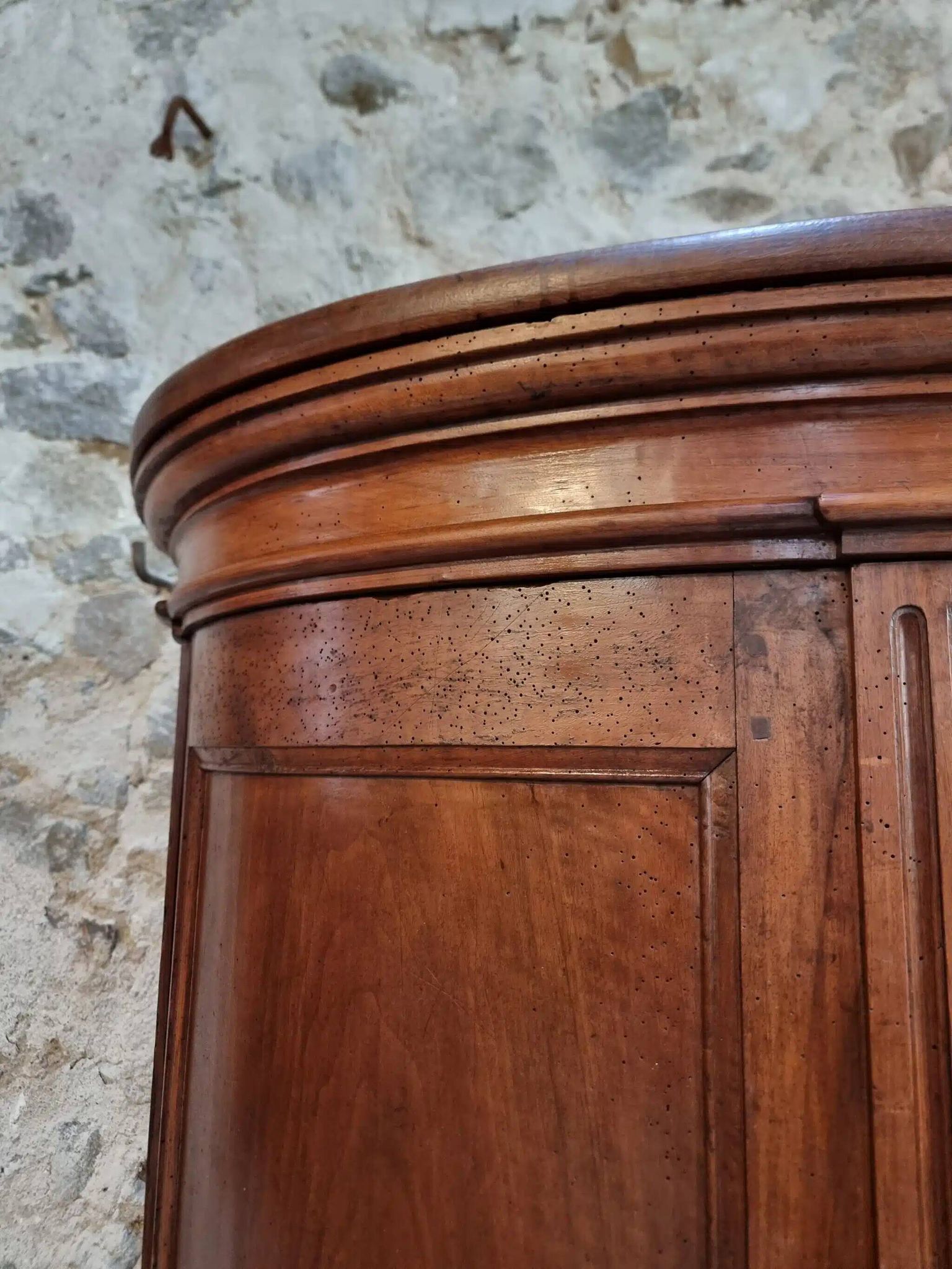 Antique demi-lune cabinet in walnut, late 18th century, French château.