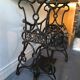 Ancient table, cast iron footing