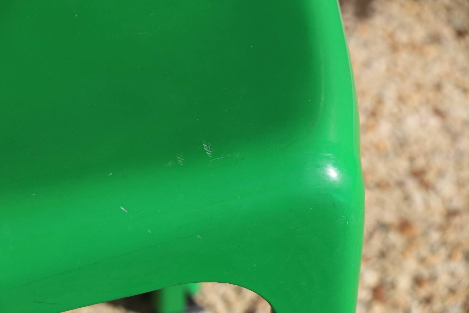Set of 4 green Selene Magistretti chairs.