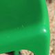 Set of 4 green Selene Magistretti chairs.