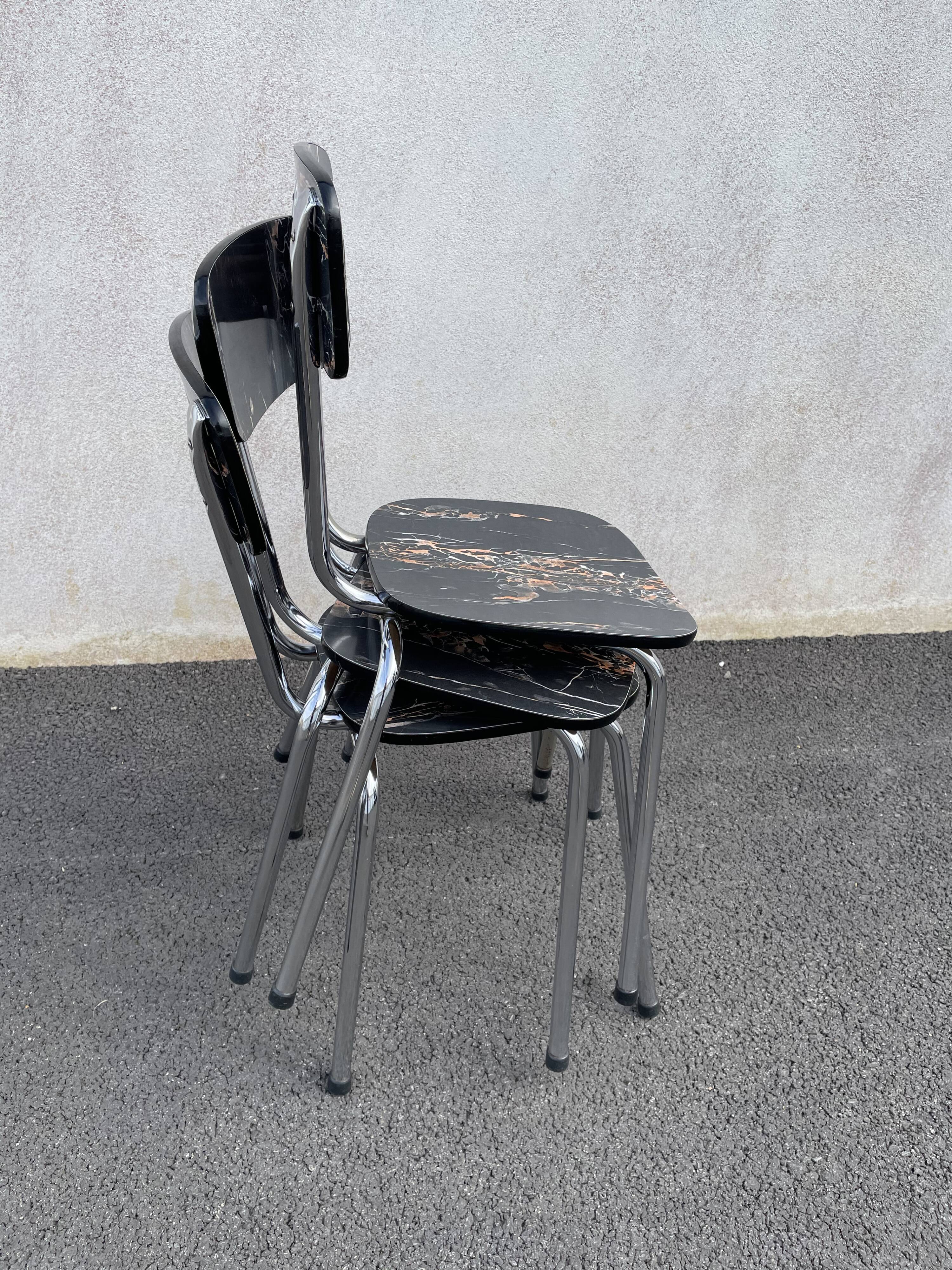 Black marbled formica chairs