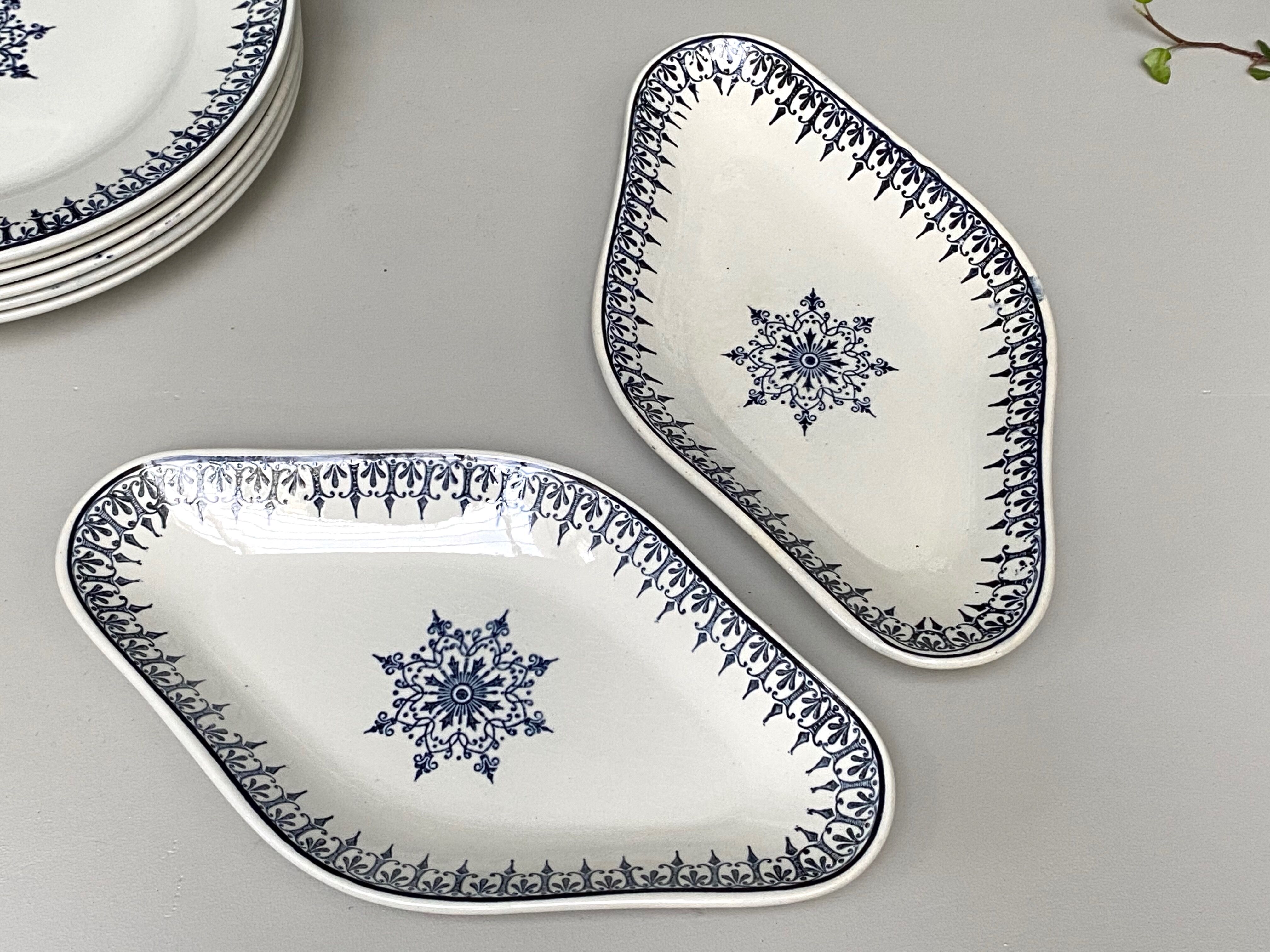 Pairs of old dishes St Amand