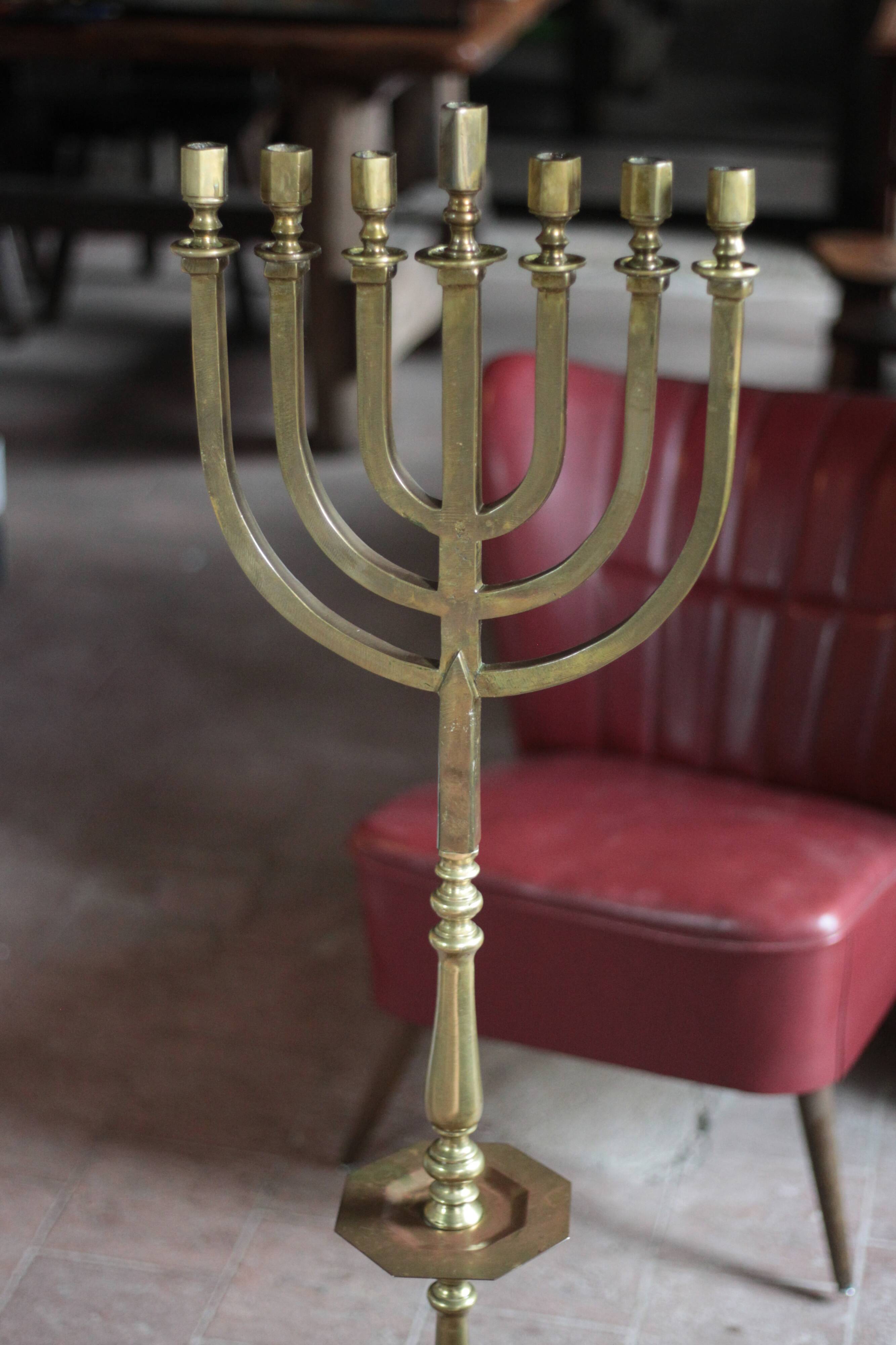 Golden bronze chandelier with seven arms, Menorah, candlestick on a stand, candelabrum.