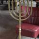 Golden bronze chandelier with seven arms, Menorah, candlestick on a stand, candelabrum.