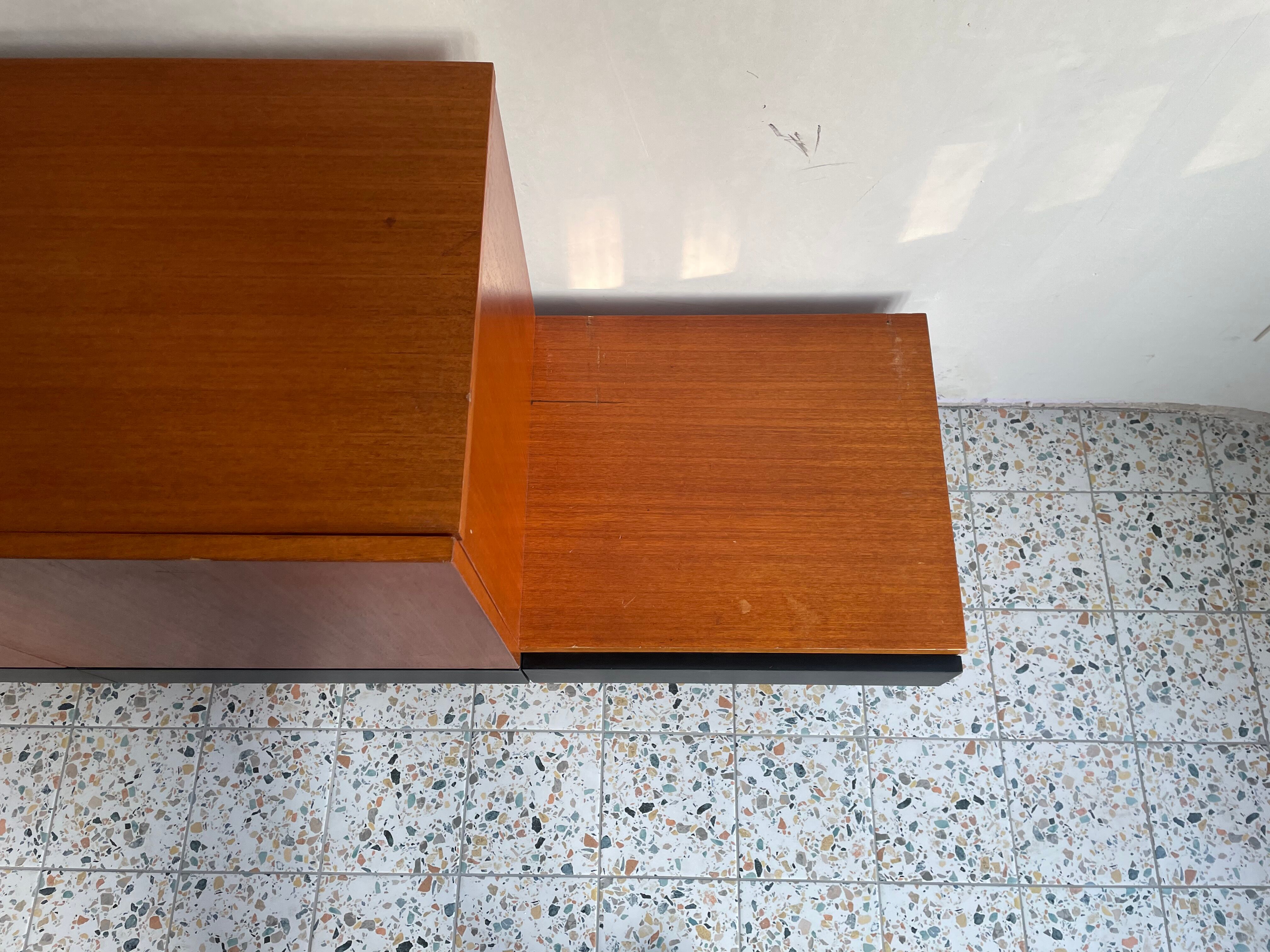 Asymmetrical vintage teak row