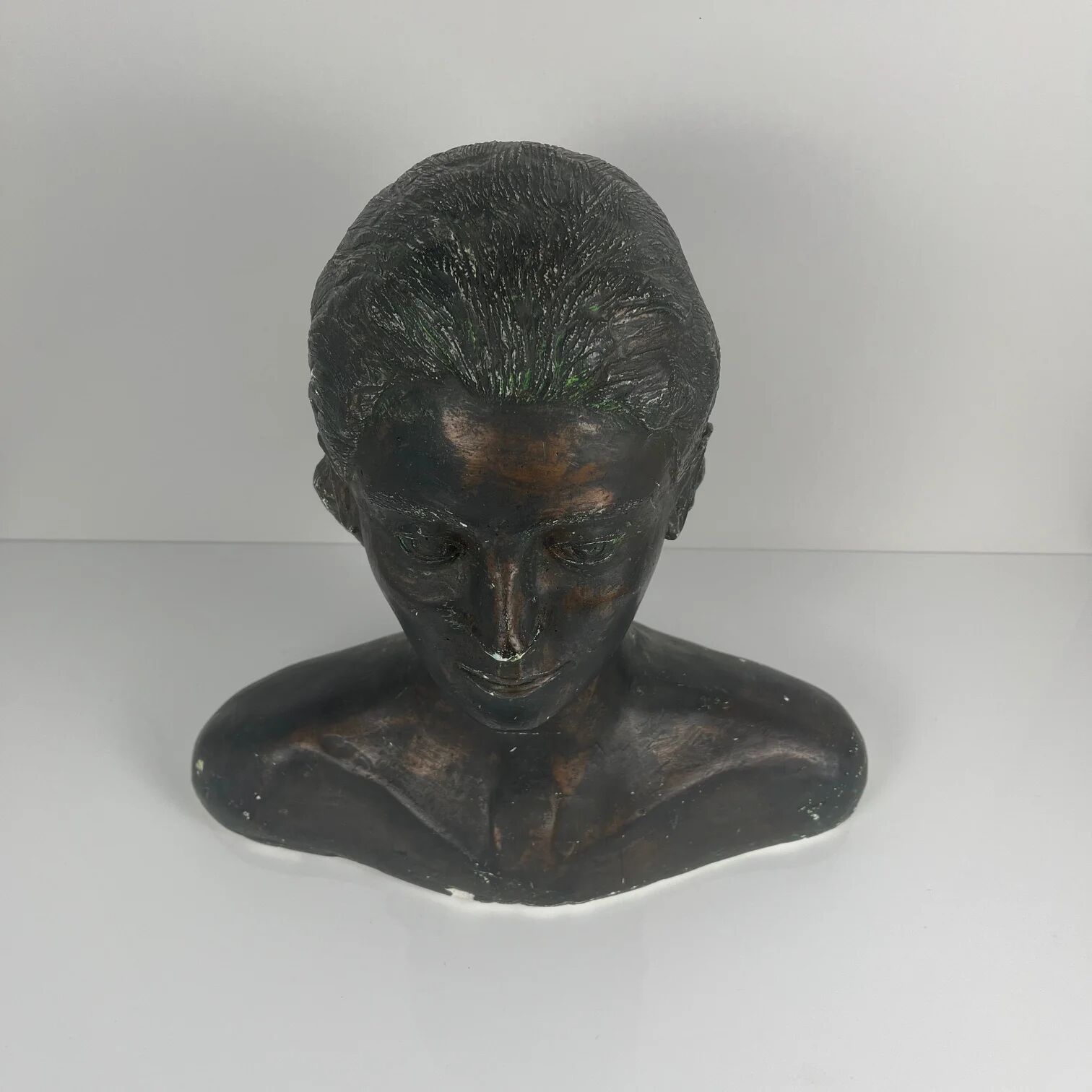 Female bust in neoclassical style in plaster by M. Mongey, 20th century.
