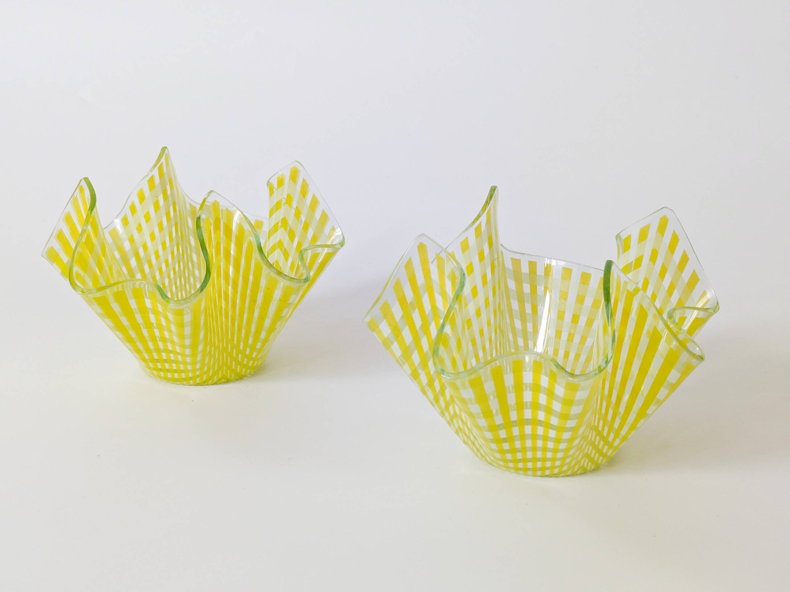 Pair of "Gingham" Chance Brothers cups with yellow checkered pattern and wavy edges.