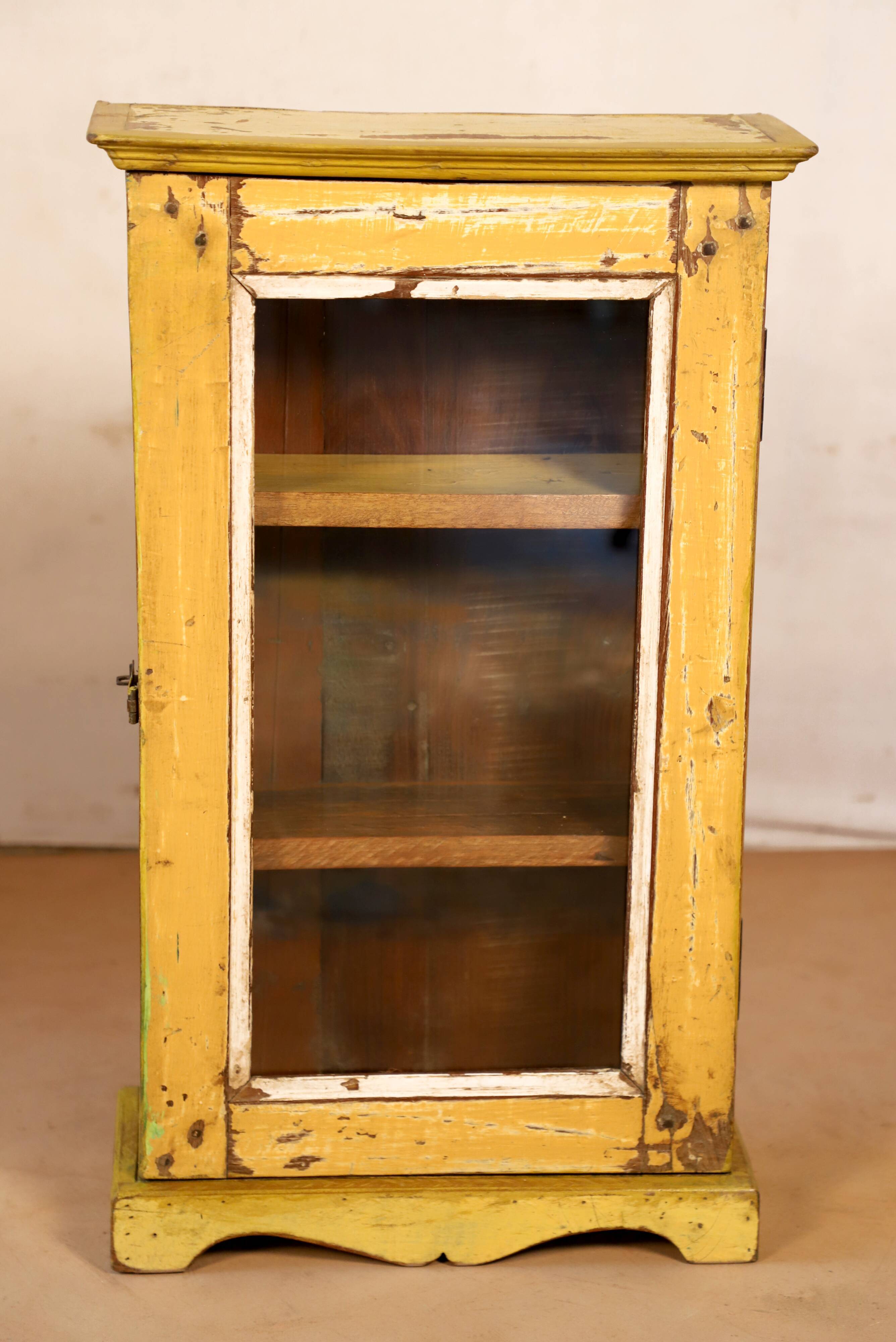 Burmese teak wall shelf with original yellow patina