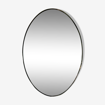 Miroir oval en laiton, Italie, circa 1960.